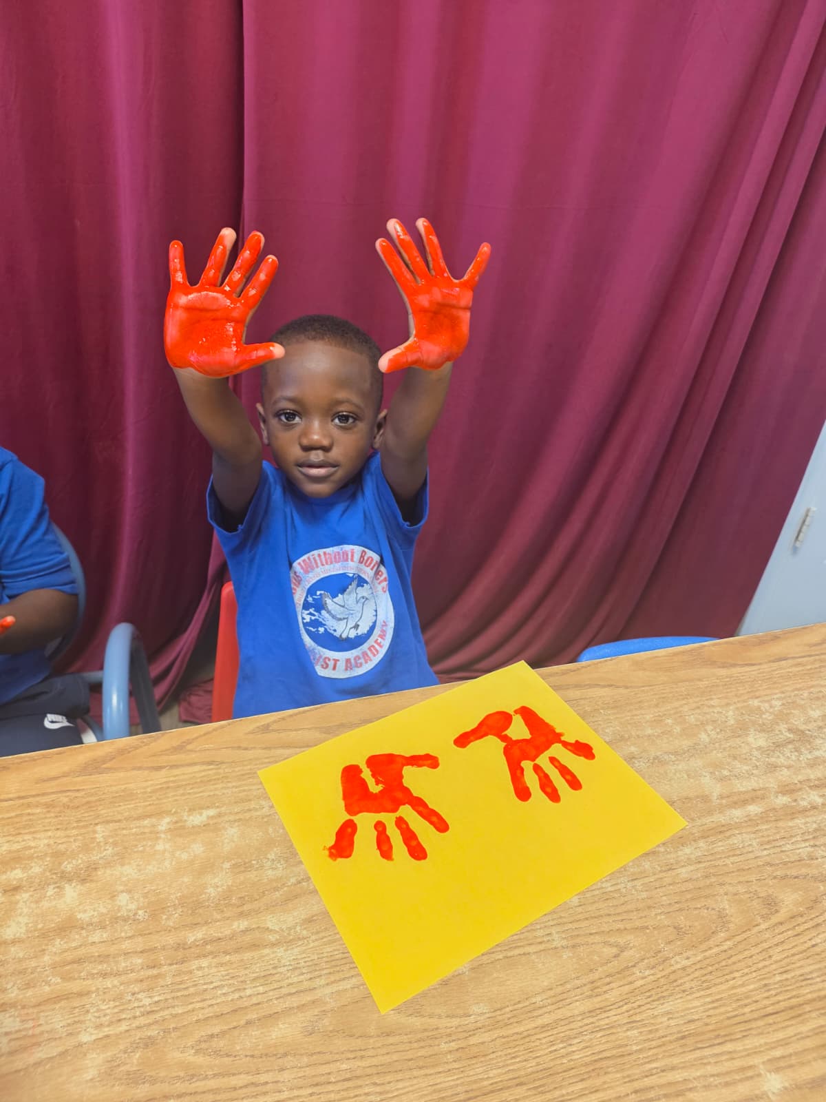 Christ Academy children doing an art activity